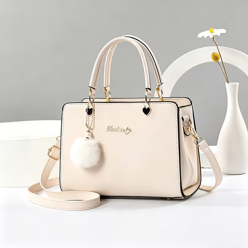 Sanika - Handbag With Pom-Pom Charm and Shoulder Strap