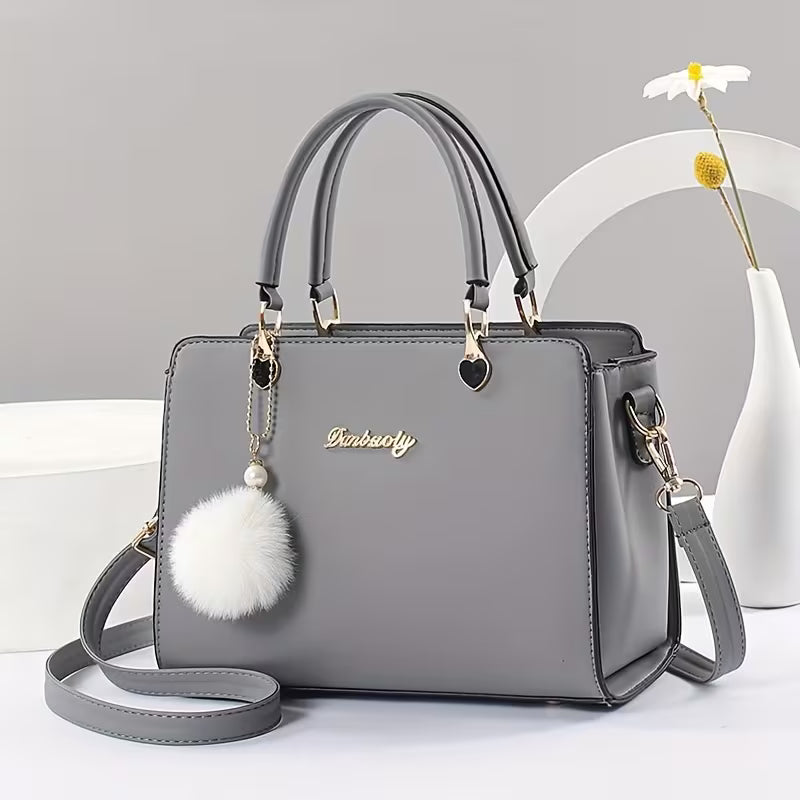 Sanika - Handbag With Pom-Pom Charm and Shoulder Strap
