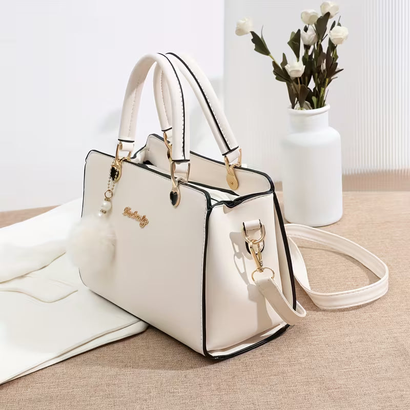Sanika - Handbag With Pom-Pom Charm and Shoulder Strap