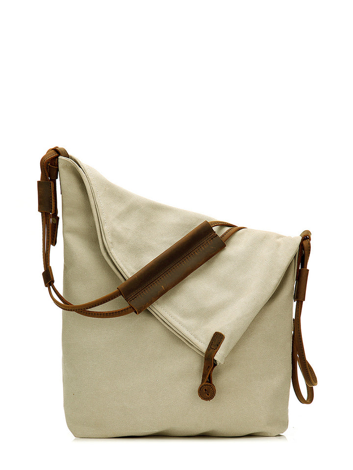 Liraine - Canvas And Leather Crossbody Bag