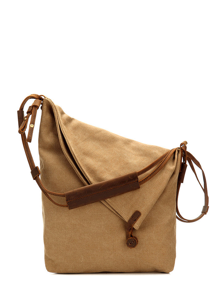 Liraine - Canvas And Leather Crossbody Bag