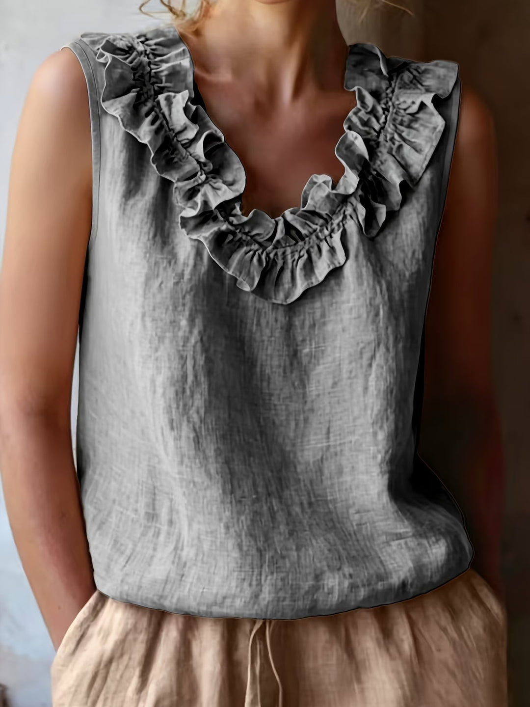 Safiya - Sleeveless Ruffle Neck Blouse