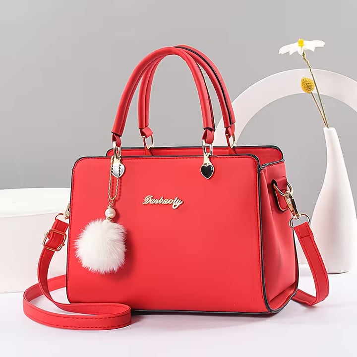 Sanika - Handbag With Pom-Pom Charm and Shoulder Strap